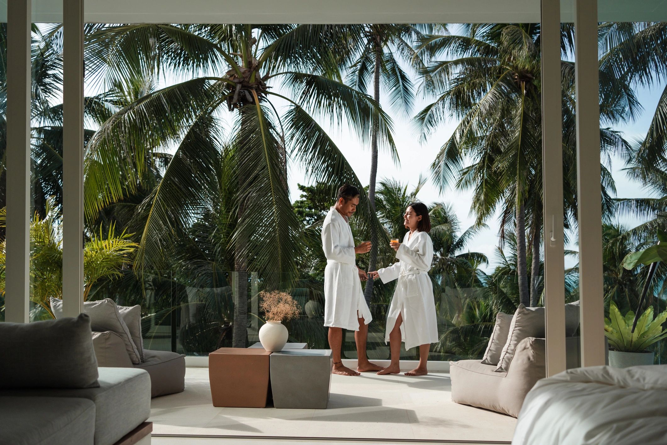 Smiling couple relaxing on a balcony
