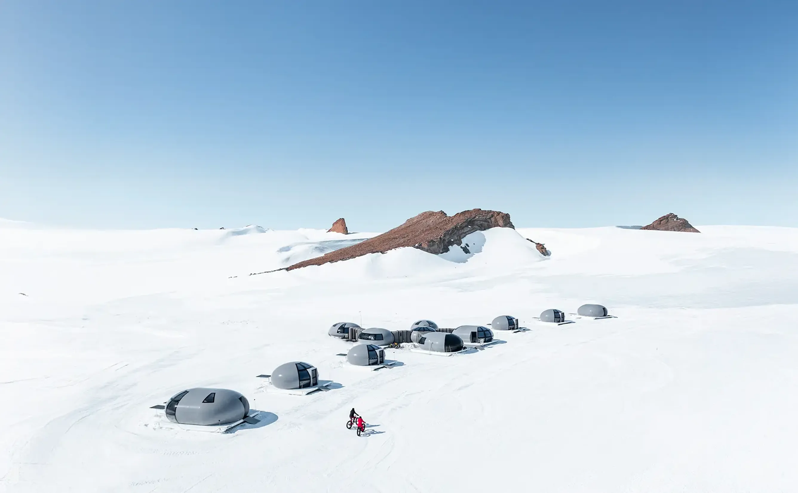 Cluster of domes on snowy polar plain