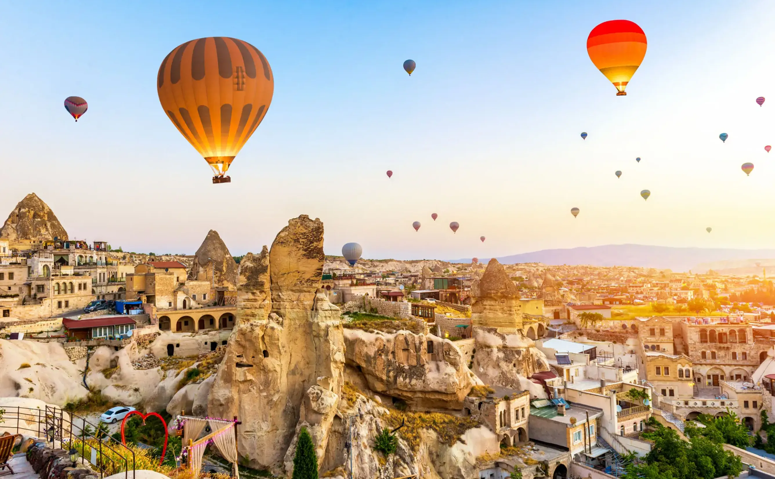 Hot air balloons over Cappadocia at sunrise