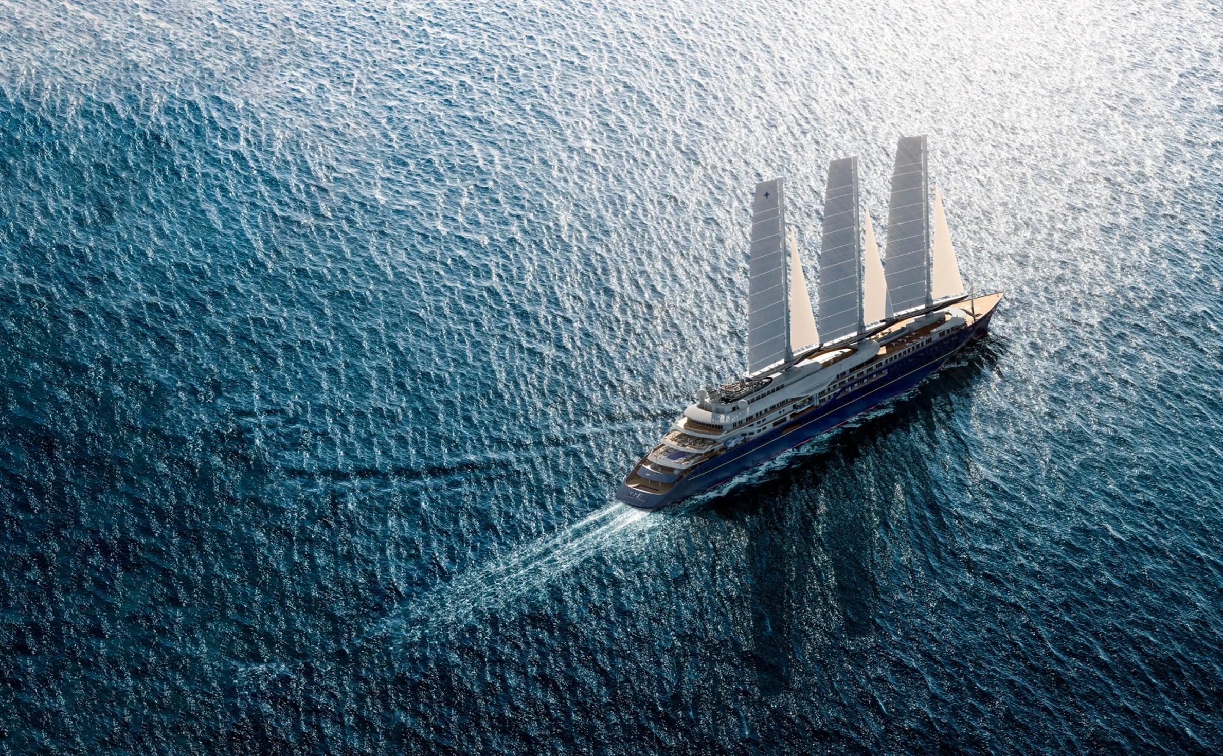 Aerial view of three-masted sailing yacht