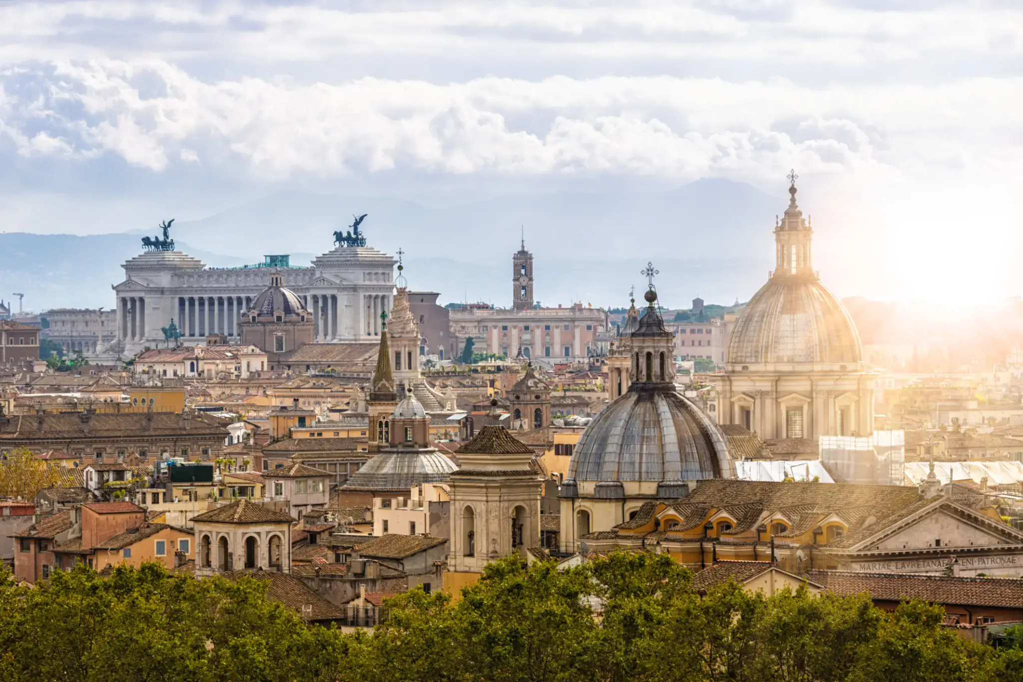 Historic Rome city view, sun flare